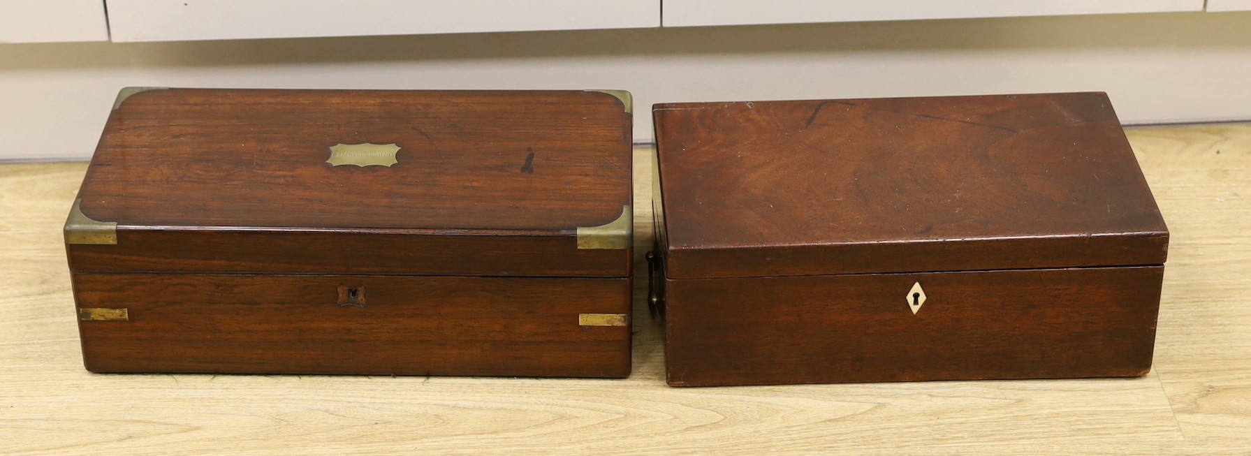 A Victorian brass bound mahogany writing slope together with another, largest 45cm